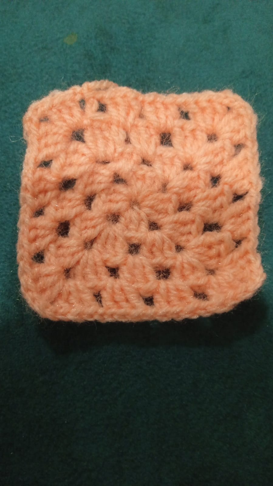 Peach granny square coaster