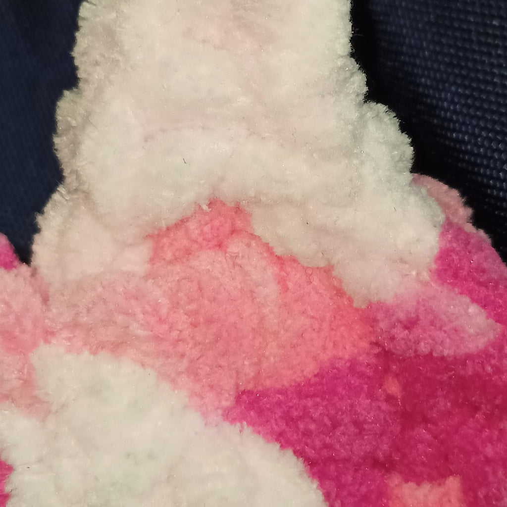Pink and white twirling starfish