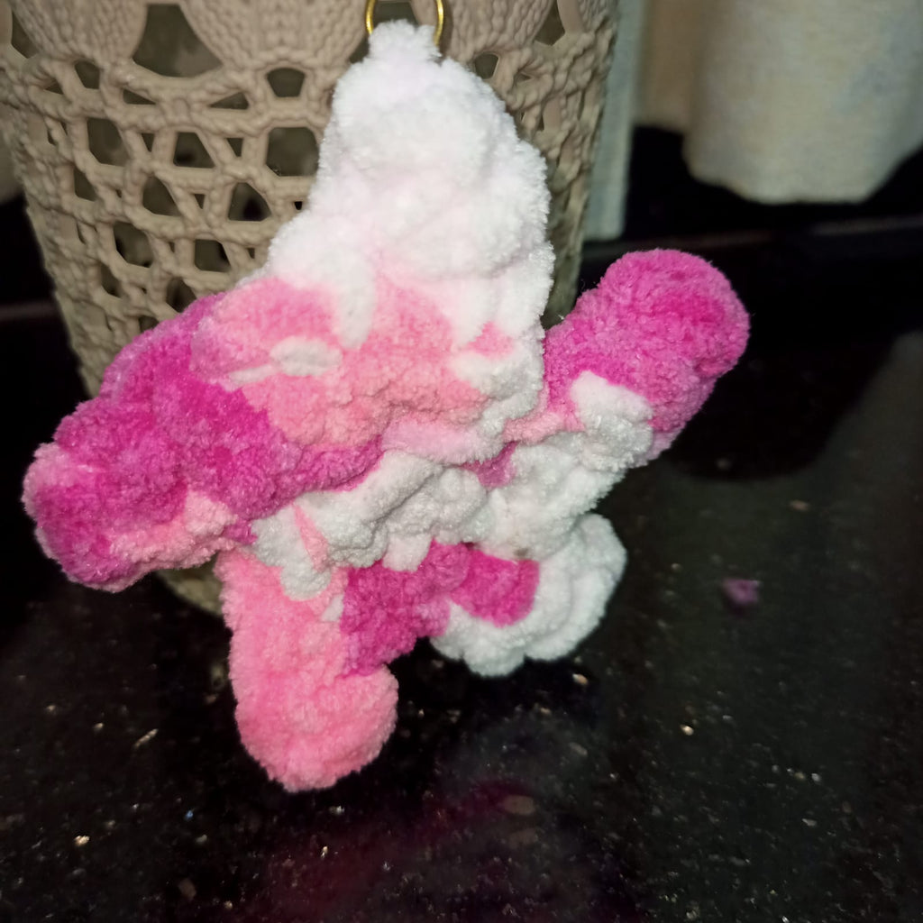 Pink and white twirling starfish