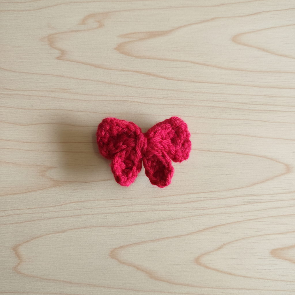 Crochet Red Bow - Flat Lay